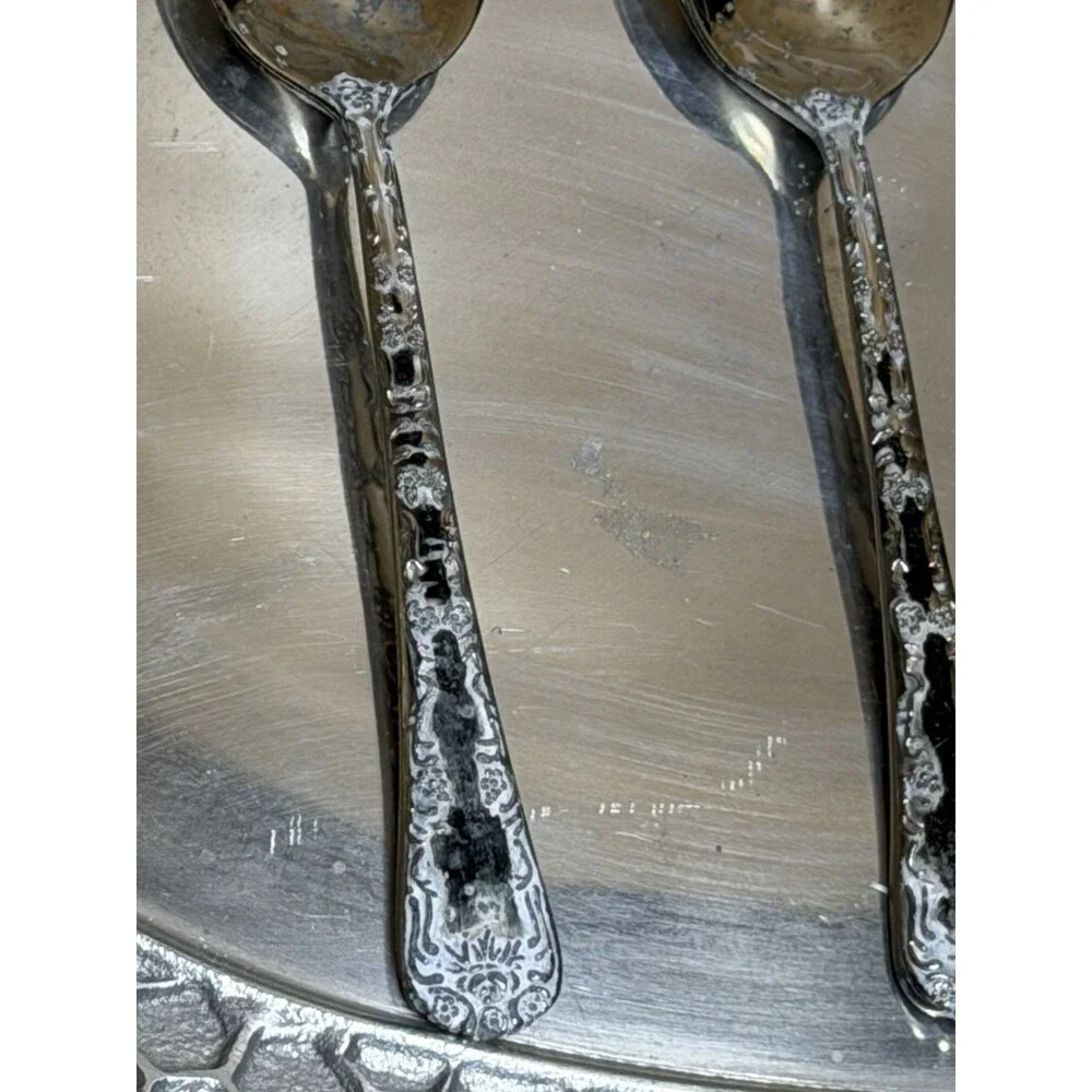 WM Rogers And Son International dessert spoons